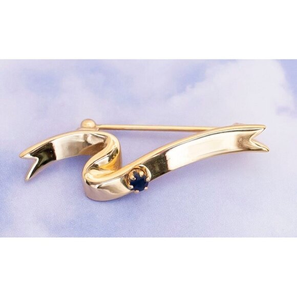 Vintage Wavy Navy Blue Rhinestone Gold Tone Brooch by Avon - S5 - Picture 2 of 3